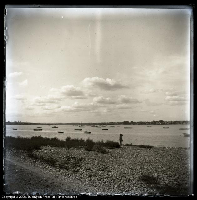 Figure on Shore with Boats